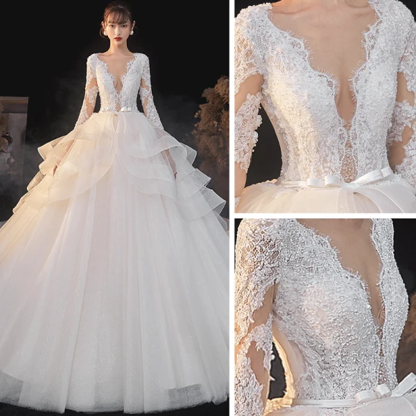 Illusion Champagne La Mariée Robe De Mariée 2020 Robe Boule Transparentes Col v profond Manches Longues Dos Nu Appliques En Dentelle Perlage Noeud Ceinture Glitter Tulle Cathedral Train Volants