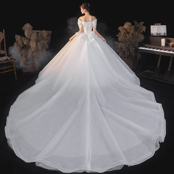 Vintage / Retro Ivory Satin Bridal Wedding Dresses 2020 Ball Gown Off-The-Shoulder Short Sleeve Backless Glitter Tulle Cathedral Train Ruffle