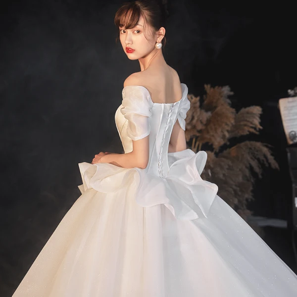 Vintage / Retro Ivory Satin Bridal Wedding Dresses 2020 Ball Gown Off-The-Shoulder Short Sleeve Backless Glitter Tulle Cathedral Train Ruffle