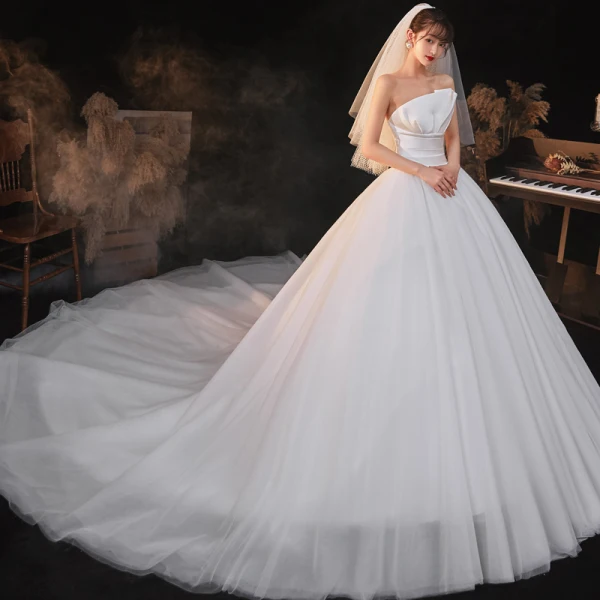 Modest / Simple Ivory Bridal Wedding Dresses 2020 Empire Strapless Sleeveless Backless Cathedral Train Ruffle