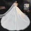 Meilleur Ivoire La Mariée Robe De Mariée 2020 Robe Boule Transparentes Encolure Carrée Manches Courtes Dos Nu Perlage Paillettes Cathedral Train Volants