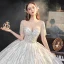 Meilleur Ivoire La Mariée Robe De Mariée 2020 Robe Boule Transparentes Encolure Carrée Manches Courtes Dos Nu Perlage Paillettes Cathedral Train Volants