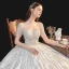 Meilleur Ivoire La Mariée Robe De Mariée 2020 Robe Boule Transparentes Encolure Carrée Manches Courtes Dos Nu Perlage Paillettes Cathedral Train Volants