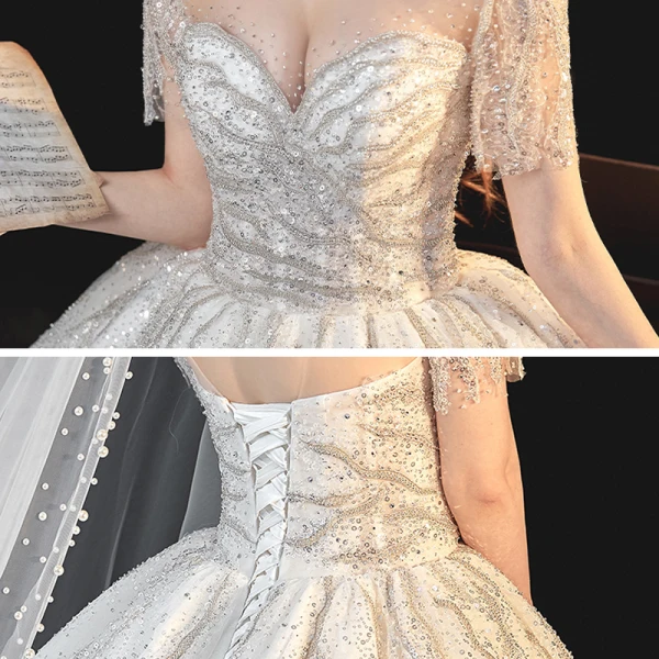 Meilleur Ivoire La Mariée Robe De Mariée 2020 Robe Boule Transparentes Encolure Carrée Manches Courtes Dos Nu Perlage Paillettes Cathedral Train Volants