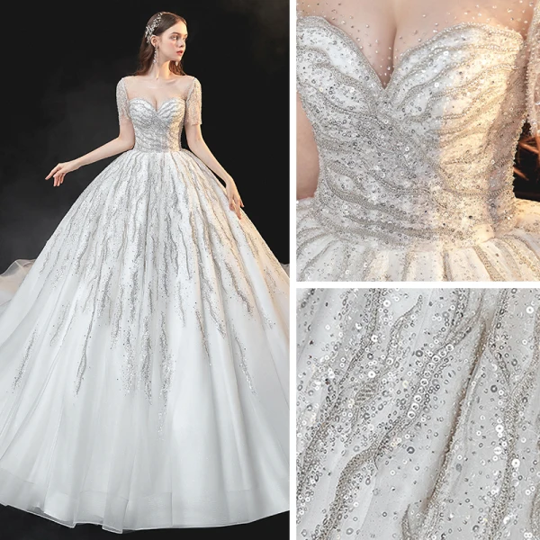 Meilleur Ivoire La Mariée Robe De Mariée 2020 Robe Boule Transparentes Encolure Carrée Manches Courtes Dos Nu Perlage Paillettes Cathedral Train Volants