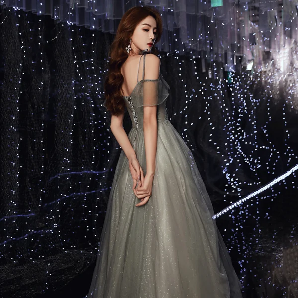 Elegant Glitter Silver Prom Dresses 2020 A Line Princess Spaghetti Straps Short Sleeve Beading Floor Length Long Ruffle Backless Formal Dresses Elegant Glitter Silver Prom Dresses 2020 A Line Princess Spaghetti Straps Short Sleeve Beading Floor Length Long Ruffle Backless Formal Dresses
