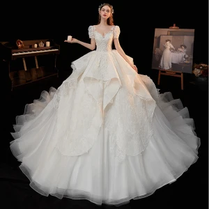 Vintage Retro Ivory Bridal Wedding Dresses 2020 Ball Gown See Through Scoop Neck Puffy Short Sleeve Backless Appliques Lace Beading Cathedral Train Ruffle
