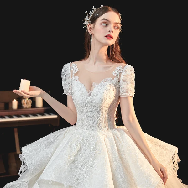 Vintage / Retro Ivory Bridal Wedding Dresses 2020 Ball Gown See-through Scoop Neck Puffy Short Sleeve Backless Appliques Lace Beading Cathedral Train Ruffle