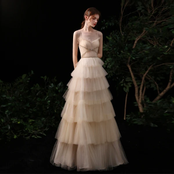 Meilleur Champagne Robe De Soirée 2020 Princesse Bretelles Spaghetti Sans Manches Paillettes Perlage Longue Volants en Cascade Dos Nu Robe De Ceremonie