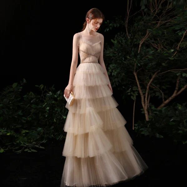 Meilleur Champagne Robe De Soirée 2020 Princesse Bretelles Spaghetti Sans Manches Paillettes Perlage Longue Volants en Cascade Dos Nu Robe De Ceremonie