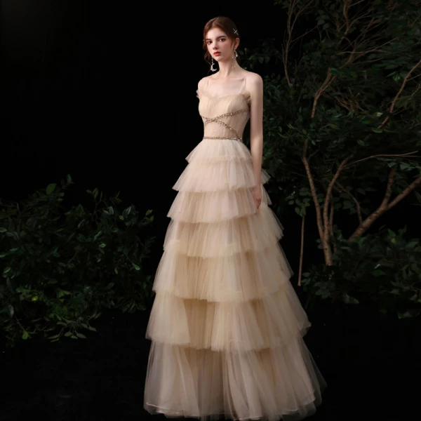 Meilleur Champagne Robe De Soirée 2020 Princesse Bretelles Spaghetti Sans Manches Paillettes Perlage Longue Volants en Cascade Dos Nu Robe De Ceremonie