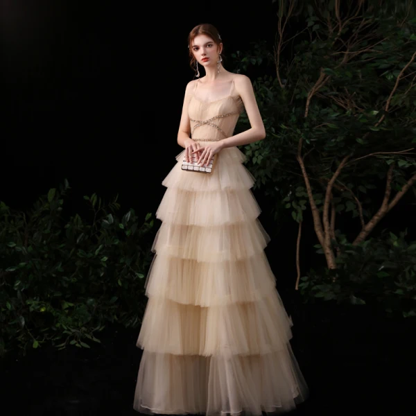 Meilleur Champagne Robe De Soirée 2020 Princesse Bretelles Spaghetti Sans Manches Paillettes Perlage Longue Volants en Cascade Dos Nu Robe De Ceremonie