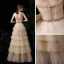Meilleur Champagne Robe De Soirée 2020 Princesse Bretelles Spaghetti Sans Manches Paillettes Perlage Longue Volants en Cascade Dos Nu Robe De Ceremonie