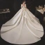 Luxe Ivoire Satin La Mariée Robe De Mariée 2020 Robe Boule Transparentes Col Haut Gonflée Manches Courtes Dos Nu Appliques En Dentelle Perlage Cathedral Train Volants