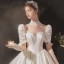 Luxe Ivoire Satin La Mariée Robe De Mariée 2020 Robe Boule Transparentes Col Haut Gonflée Manches Courtes Dos Nu Appliques En Dentelle Perlage Cathedral Train Volants