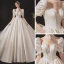 Luxe Ivoire Satin La Mariée Robe De Mariée 2020 Robe Boule Transparentes Col Haut Gonflée Manches Courtes Dos Nu Appliques En Dentelle Perlage Cathedral Train Volants