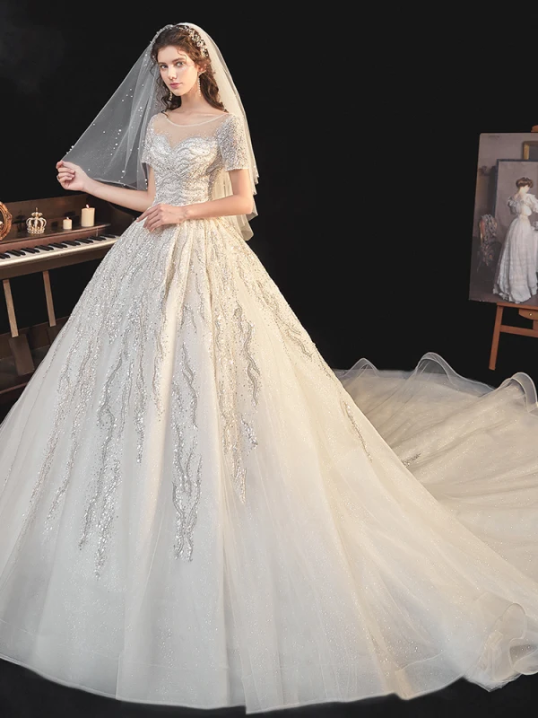 Élégant Champagne La Mariée Robe De Mariée 2020 Robe Boule Transparentes Encolure Dégagée Manches Courtes Dos Nu Paillettes Perlage Glitter Tulle Cathedral Train Volants