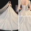 Élégant Champagne La Mariée Robe De Mariée 2020 Robe Boule Transparentes Encolure Dégagée Manches Courtes Dos Nu Paillettes Perlage Glitter Tulle Cathedral Train Volants