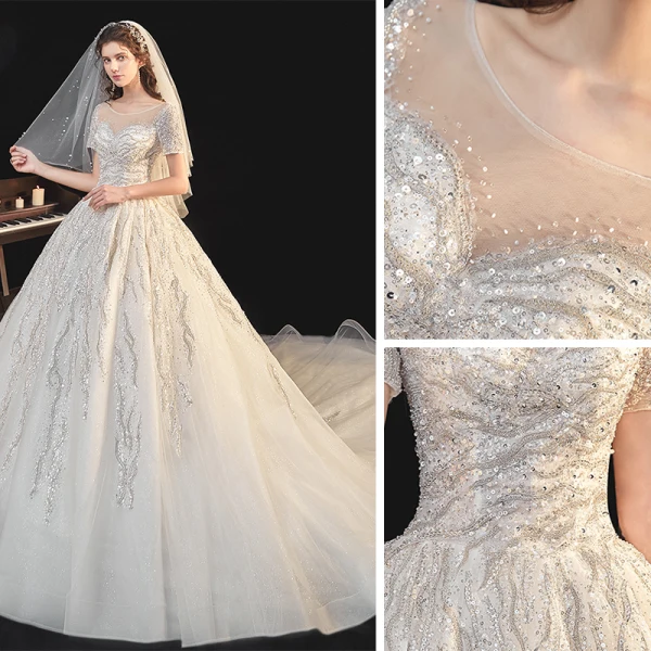 Élégant Champagne La Mariée Robe De Mariée 2020 Robe Boule Transparentes Encolure Dégagée Manches Courtes Dos Nu Paillettes Perlage Glitter Tulle Cathedral Train Volants