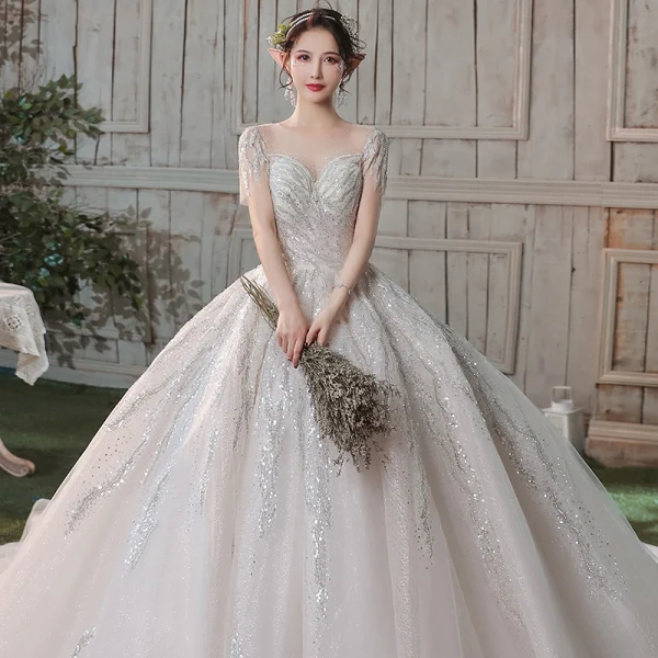 Romantique Champagne Transparentes La Mariée Robe De Mariée 2020 Robe Boule Encolure Dégagée Manches Courtes Dos Nu Paillettes Perlage Glitter Tulle Cathedral Train Volants