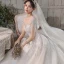 Romantique Champagne Transparentes La Mariée Robe De Mariée 2020 Robe Boule Encolure Dégagée Manches Courtes Dos Nu Paillettes Perlage Glitter Tulle Cathedral Train Volants
