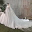 Romantique Champagne Transparentes La Mariée Robe De Mariée 2020 Robe Boule Encolure Dégagée Manches Courtes Dos Nu Paillettes Perlage Glitter Tulle Cathedral Train Volants