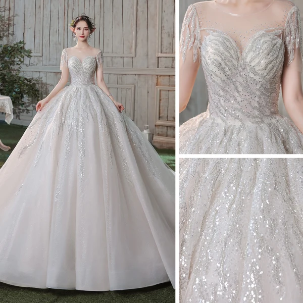 Romantique Champagne Transparentes La Mariée Robe De Mariée 2020 Robe Boule Encolure Dégagée Manches Courtes Dos Nu Paillettes Perlage Glitter Tulle Cathedral Train Volants