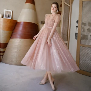Vintage Rødmende Rosa Gjennomsiktig Dancing Ballkjoler 2020 Prinsesse Høy Hals Puffy Korte Ermer Paljetter Tyll Beading Perle Sash Te Lengde Buste Ryggløse Formelle Kjoler