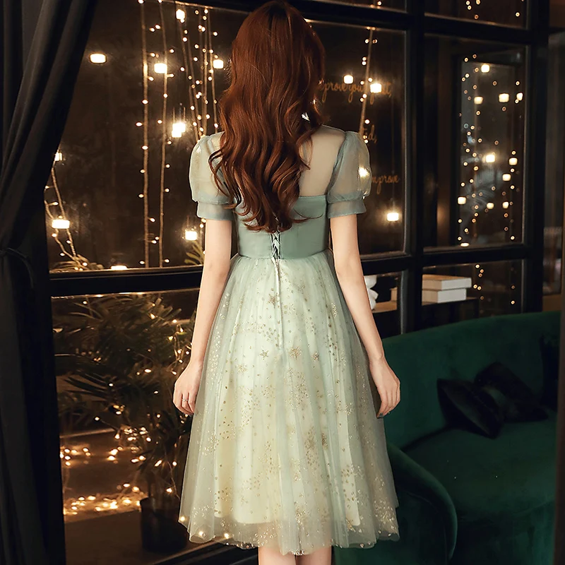 Vintage Retro Sage Green Homecoming Graduation Dresses 2020 A Line Princess See Through High Neck Short Sleeve Appliques Lace Beading Tea Length Ruffle Backless Formal Dresses Vintage Retro Sage Green Homecoming Graduation Dresses 2020 A Line Princess See Through High Neck Short Sleeve Appliques Lace Beading Tea Length Ruffle Backless Formal Dresses