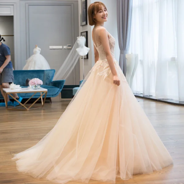 Chic / Beautiful Champagne Tulle Wedding Dresses 2017 A-Line / Princess Scoop Neck Sleeveless Crossed Straps Appliques Lace Sweep Train