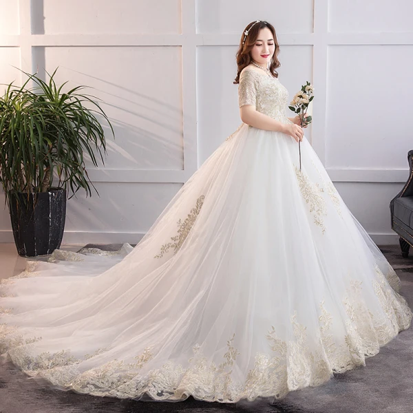 Unique Blanche Grande Taille Robe De Mariée 2019 Princesse Chapel Train En Dentelle Manches Courtes Appliques Bustier Dos Nu Église Mariage