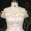 Sexy Atemberaubend Champagner Plus Größe Ballkleid Brautkleider / Hochzeitskleider 2020 Spitze Tülle Gekreuzte Träger Handgefertigt Perlenstickerei Pailletten Applikationen Rückenfreies Kapelle-Schleppe Hochzeit