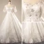Luxury / Gorgeous Ivory 2018 Wedding Crossed Straps Lace Tulle U-Neck 1/2 Sleeves Appliques Backless Beading Summer Ball Gown Wedding Dresses