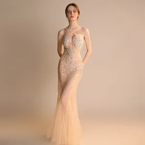 Sexy Champagne Gjennomsiktig Selskapskjoler 2018 Trompet Havfrue Skuldre Uten Ermer Rhinestone Beading Lange Buste Ryggløse Formelle Kjoler