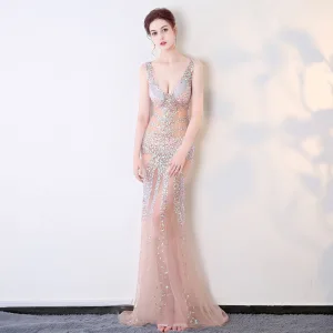 Sexy Champagne See Through Summer Evening Dresses 2018 Trumpet Mermaid V Neck Sleeveless Rhinestone Beading Sweep Train Ruffle Backless Formal Dresses
