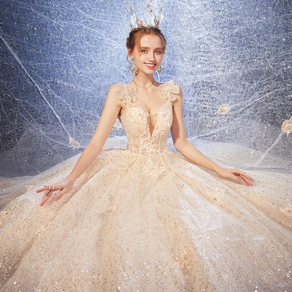 Elegant Champagne Wedding Dresses 2020 Ball Gown Flower Spaghetti Straps Deep V-Neck Sleeveless Backless Glitter Tulle Appliques Lace Sequins Beading Cathedral Train Ruffle