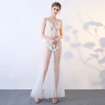 Sexy Ivory See Through Evening Dresses 2018 Trumpet Mermaid V Neck Sleeveless Appliques Flower Rhinestone Floor Length Long Ruffle Backless Formal Dresses