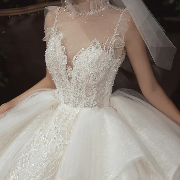 Luxury / Gorgeous Champagne See-through Wedding Dresses 2020 Ball Gown High Neck Sleeveless Backless Appliques Lace Beading Royal Train Ruffle