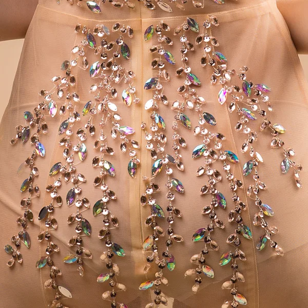 Sexy Champagne Transparentes Robe De Soirée 2018 Trompette / Sirène Encolure Dégagée Sans Manches Perlage Gland Train De Balayage Volants Dos Nu Robe De Ceremonie