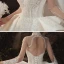 Vintage / Originale Transparentes Ivoire Satin Robe De Mariée 2020 Robe Boule Col Haut Manches Longues Dos Nu Appliques En Dentelle Fait main Perlage Royal Train Volants