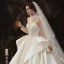 Vintage / Originale Transparentes Ivoire Satin Robe De Mariée 2020 Robe Boule Col Haut Manches Longues Dos Nu Appliques En Dentelle Fait main Perlage Royal Train Volants