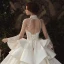 Vintage / Originale Transparentes Ivoire Satin Robe De Mariée 2020 Robe Boule Col Haut Manches Longues Dos Nu Appliques En Dentelle Fait main Perlage Royal Train Volants