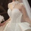 Vintage / Originale Transparentes Ivoire Satin Robe De Mariée 2020 Robe Boule Col Haut Manches Longues Dos Nu Appliques En Dentelle Fait main Perlage Royal Train Volants