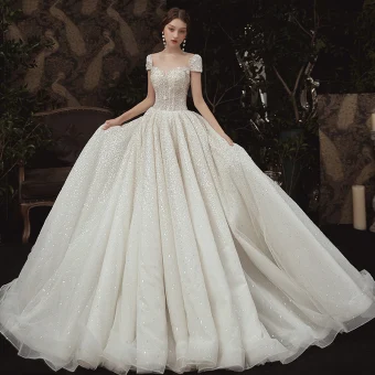 Luxury Gorgeous Ivory Outdoor Garden Wedding Dresses 2020 A Line Princess See Through Scoop Neck Short Sleeve Backless Glitter Tulle Sequins Beading Sweep Train Ruffle