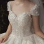 Luxus / Herrlich Ivory / Creme Garten / Im Freien Brautkleider / Hochzeitskleider 2020 A Linie Durchsichtige Rundhalsausschnitt Kurze Ärmel Rückenfreies Glanz Tülle Pailletten Perlenstickerei Sweep / Pinsel Zug Rüschen