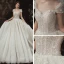 Luxus / Herrlich Ivory / Creme Garten / Im Freien Brautkleider / Hochzeitskleider 2020 A Linie Durchsichtige Rundhalsausschnitt Kurze Ärmel Rückenfreies Glanz Tülle Pailletten Perlenstickerei Sweep / Pinsel Zug Rüschen