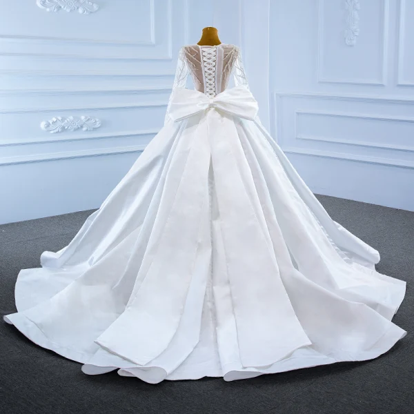 Luxe Blanche Satin La Mariée Robe De Mariée 2021 Robe Boule Transparentes Encolure Dégagée Manches Longues Dos Nu Perlage Paillettes Noeud Ceinture Tribunal Train