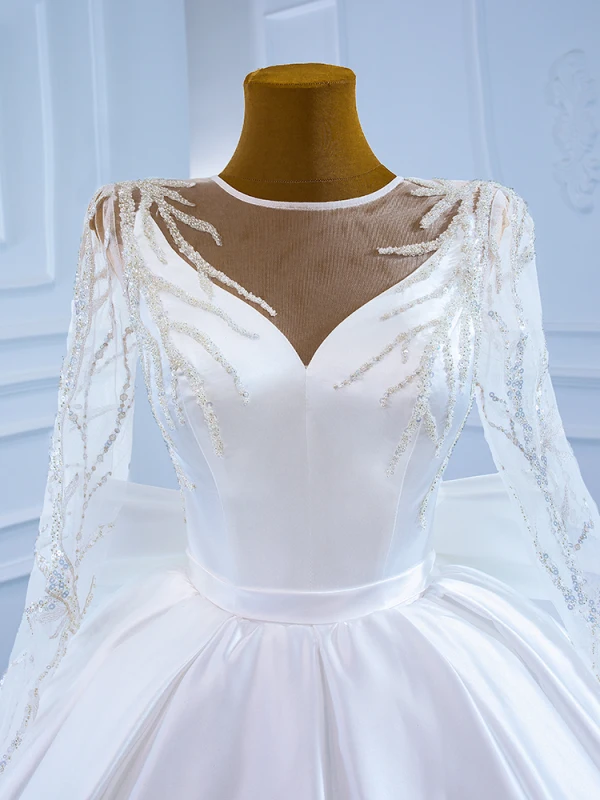 Luxe Blanche Satin La Mariée Robe De Mariée 2021 Robe Boule Transparentes Encolure Dégagée Manches Longues Dos Nu Perlage Paillettes Noeud Ceinture Tribunal Train