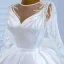 Luxe Blanche Satin La Mariée Robe De Mariée 2021 Robe Boule Transparentes Encolure Dégagée Manches Longues Dos Nu Perlage Paillettes Noeud Ceinture Tribunal Train