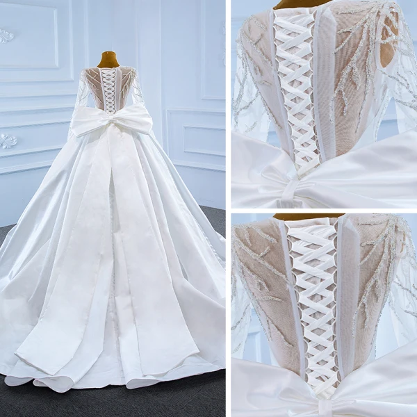 Luxe Blanche Satin La Mariée Robe De Mariée 2021 Robe Boule Transparentes Encolure Dégagée Manches Longues Dos Nu Perlage Paillettes Noeud Ceinture Tribunal Train